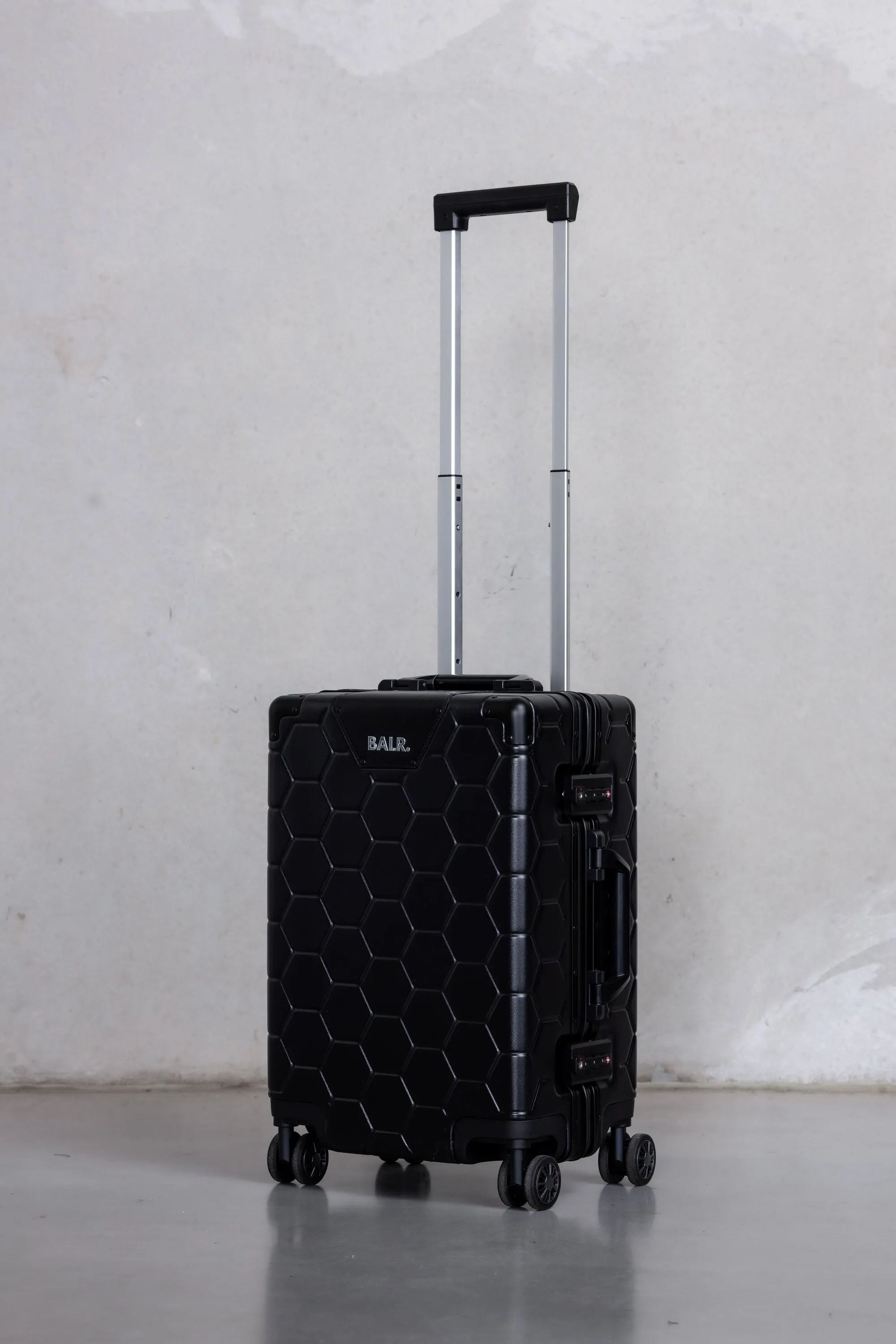 Romeo Embossed Hexagon Suitcase Jet Black